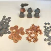 654b00fdb6c7305662f3c98cf327a728.jpg Zamienniki żetonów pasujące do gry Nucleum | Nucleum Upgrade Pack